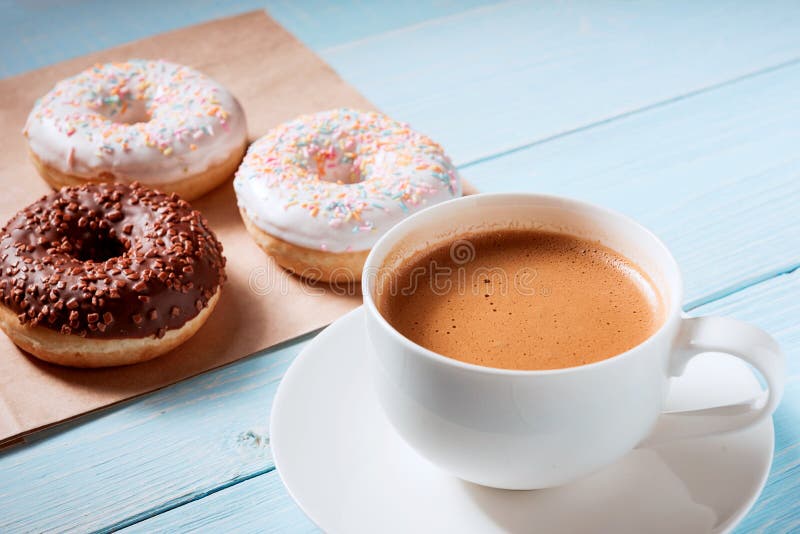 Breakfast of Donuts and Coffee Stock Photo Image of cafe, holding