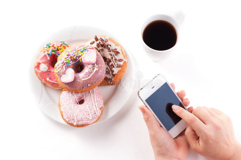 Breakfast with donuts royalty free stock images Breakfast with donuts royalty free stock images