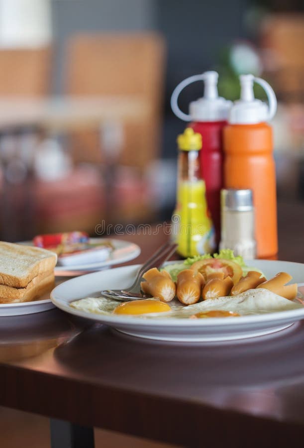 Breakfast Fried Egg and Hot Dog and Bread Stock Photo Image of tomato