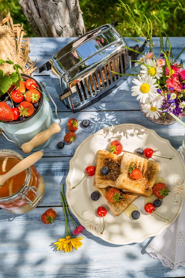 Breakfast in the Garden with Toast and Fruit Stock Photo Image of