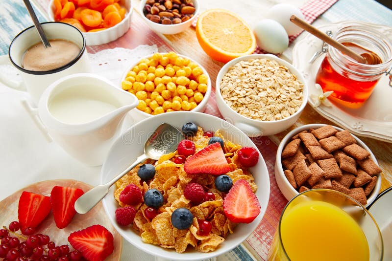 Breakfast healthy cereal coffee and orange juice royalty free stock images