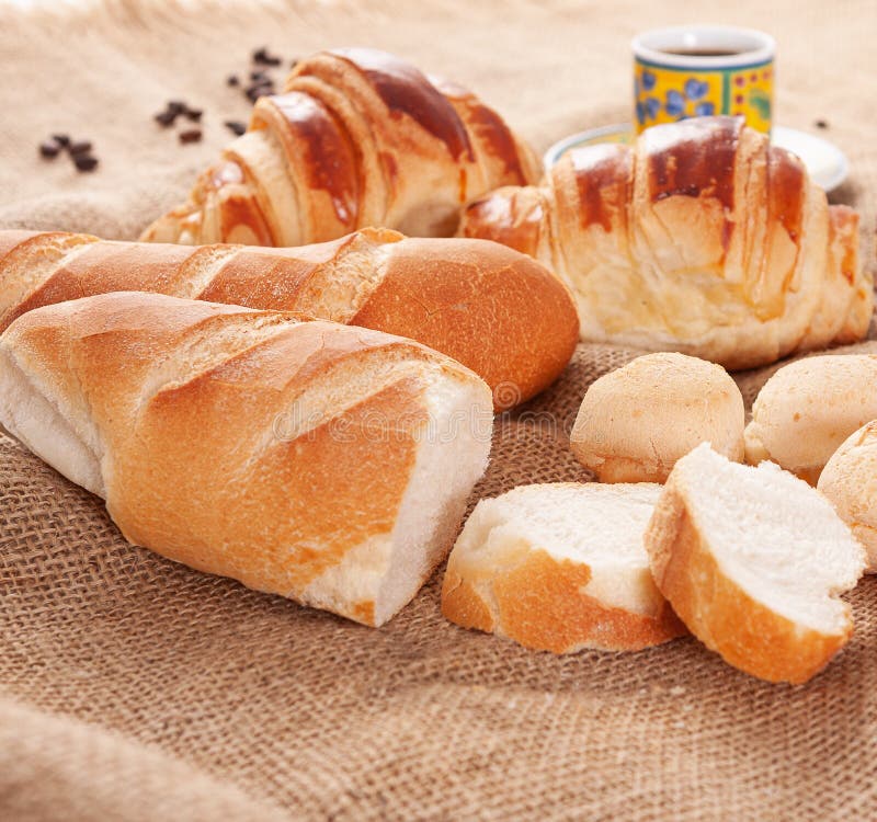 Breakfast with Italian Bread, Cheese Bread, Chocolate Donut, Coffee and