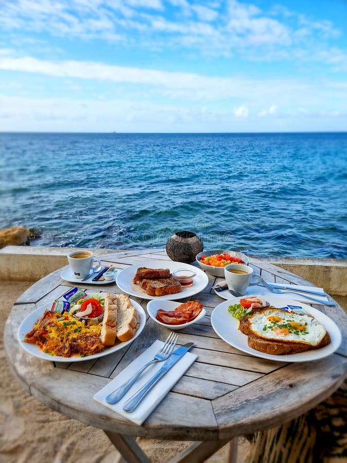 Breakfast On The Beach By The Pool With A Look Over The Ocean Of La Digeu Seychelles Stock Image