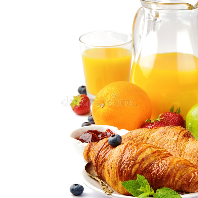Breakfast with orange juice and fresh croissants stock images Breakfast with orange juice and fresh croissants stock images