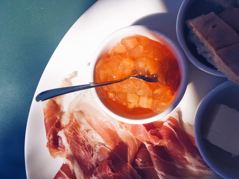 Breakfast Outdoors in Summer, Ham, Jam, Butter and Ham Stock Photo