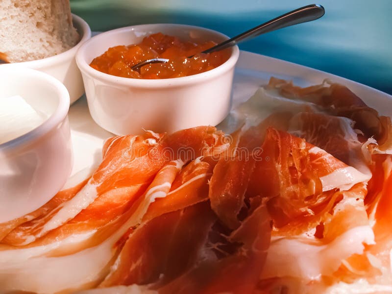 Breakfast Outdoors in Summer, Ham, Jam, Butter and Ham Stock Photo