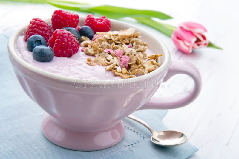 Breakfast with a pink tulip stock image