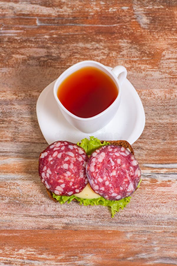 Breakfast with Salami Sandwich and Cup of Tea Stock Image Image of