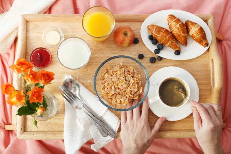 Breakfast served in bed royalty free stock image.