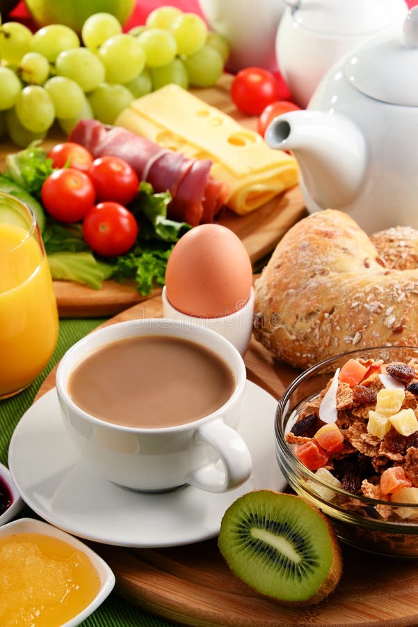 Breakfast Served with Coffee, Orange Juice, Egg and Fruits Stock Image