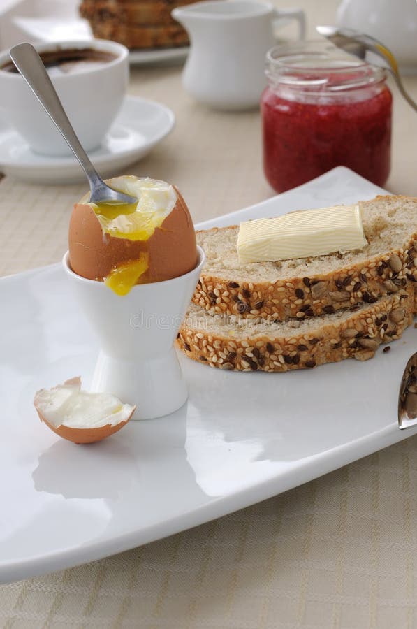 Breakfast with Softboiled Egg and Slices of Oatmeal Bread Stock Image