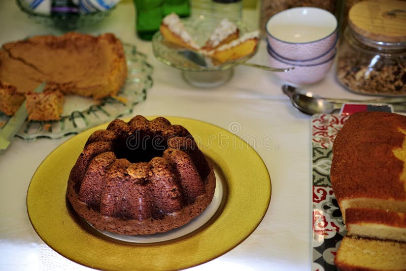 Breakfast table with assorted delicious cakes. stock photo Breakfast table with assorted delicious cakes. stock photo