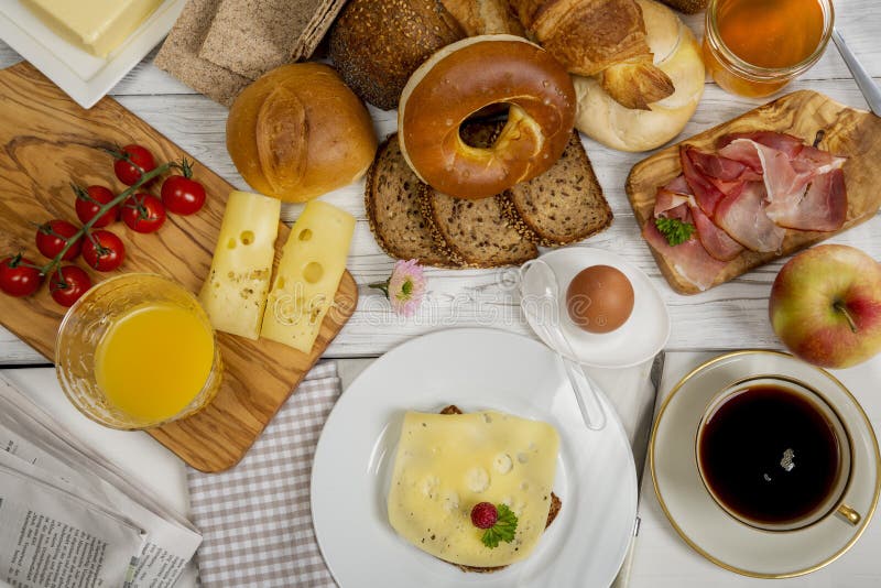 Breakfast Table with Cheese Bread, Coffee, Egg, Ham and Jam Stock Image