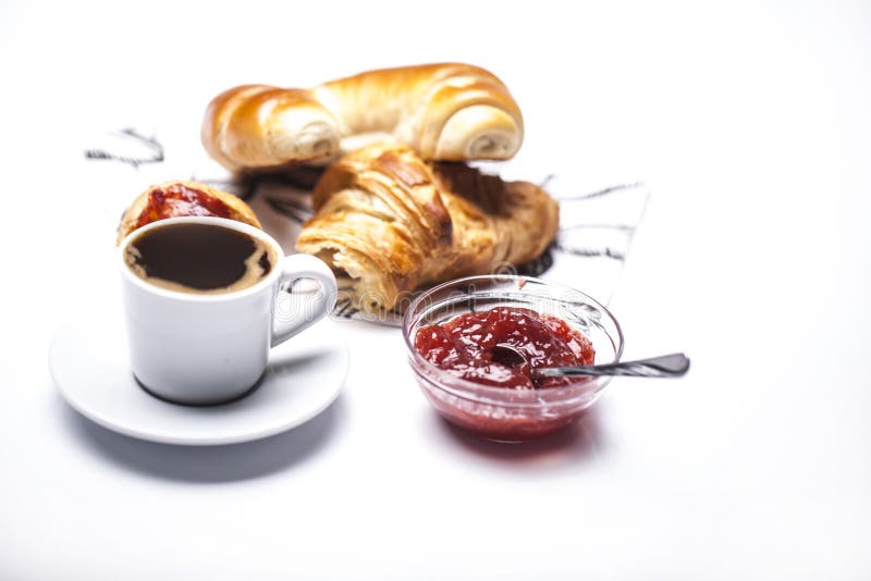 Croissant with marmolade and coffee