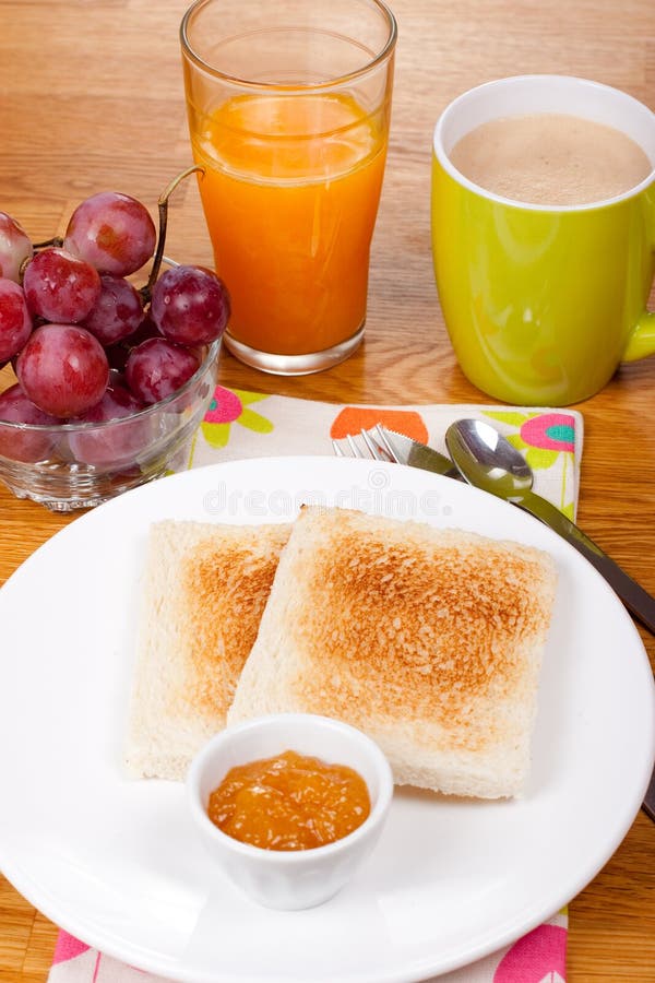 Breakfast with Toast, Orange Juice and Grapes Stock Photo Image of