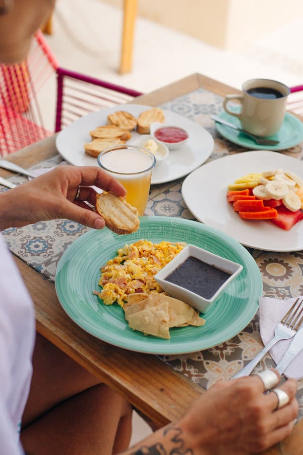 Breakfast for Tourist in the Hotel with Eggs, Toast and Fruit Stock