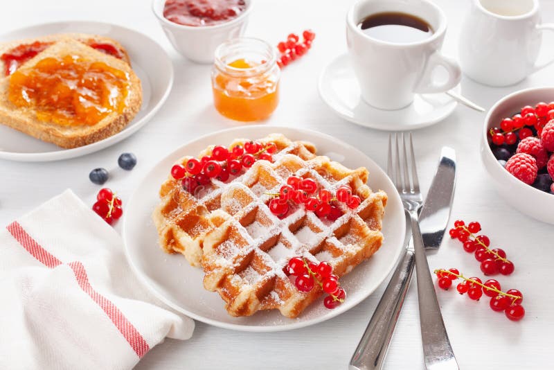 Breakfast with Waffle, Toast, Berry, Jam, Chocolate Spread and Coffee
