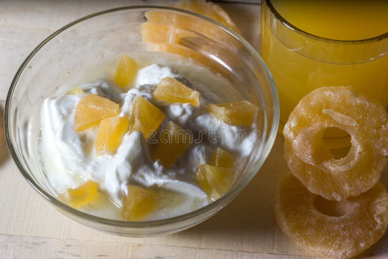 Breakfast with Yogurt with Pieces of Pineapple and Orange Juice Stock