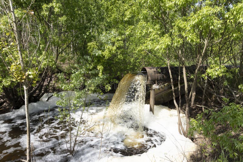 Breakthrough of a Sewer Pipe with a Flowing Stream of Water Forming