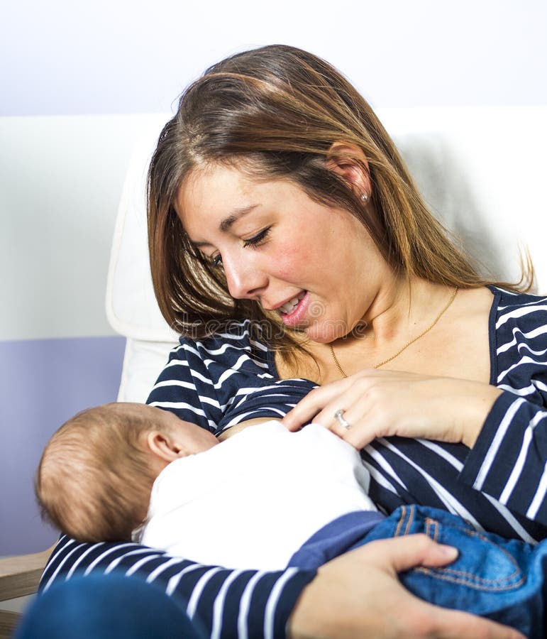 Breast feeding baby stock image. Image of child, female 61776599
