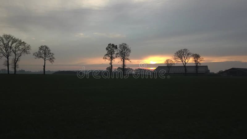Winter Sunset Drone Over Farm Field