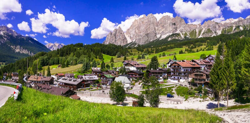 Breathtaking Alpine scenery, Dolomite mountains. beautiful Cortina d`Ampezzo village, famous ski resort in northern Italy