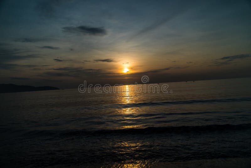 Breathtaking view of the beautiful sunset reflected in the sea - perfect for a gorgeous background royalty free stock photos
