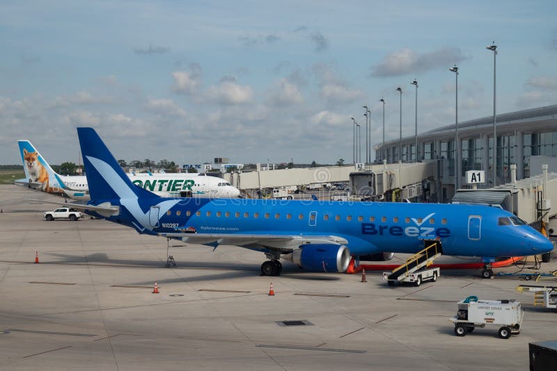 Breeze Airways Plane at a Gate at Louis Armstrong New Orleans International Airport