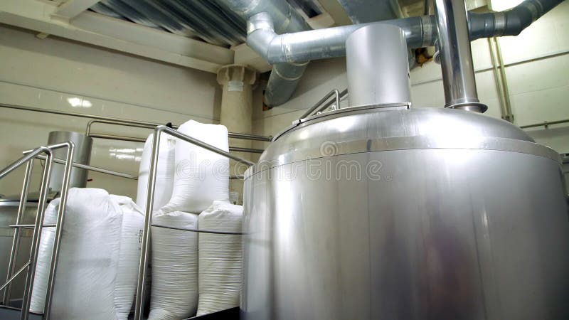 Brewery. Tanks filled with malt and beer