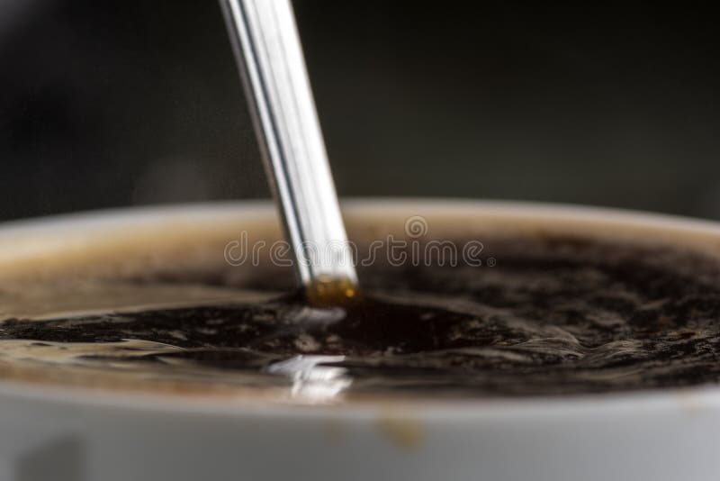 Brewing Boiling Water Instant Coffee in a Mug Closeup Stock Image