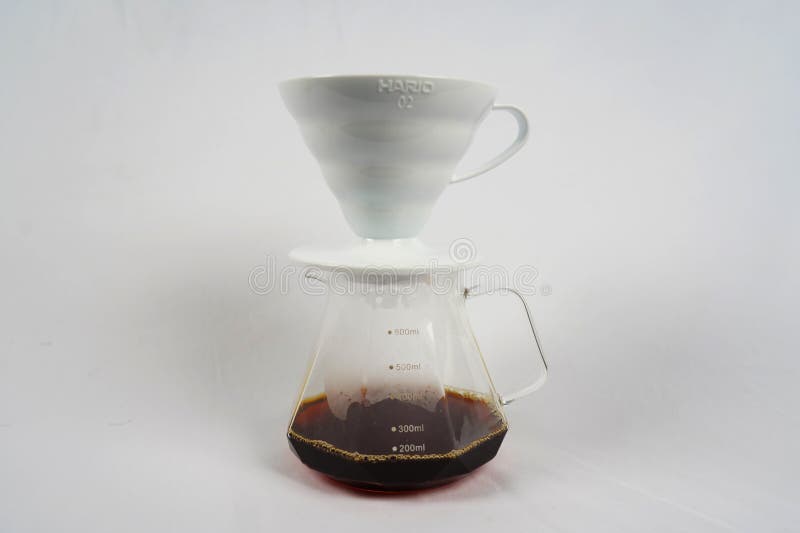 Brewing Coffee in a Funnel. the Hario V60 Coffee Funnel is on the