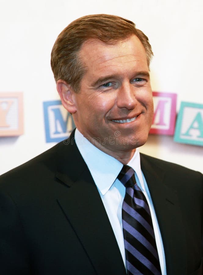 NBC news anchor Brian Williams smiles as arrives on the red carpet for the premiere of the comedy Baby Mama starring two of the network's stalwart stars, Tina Fey and Amy Poehler. The event, kicking off the 7th Annual Tribeca Film Festival, took place at the Ziegfeld Theatre in New York City; April 23, 2008.