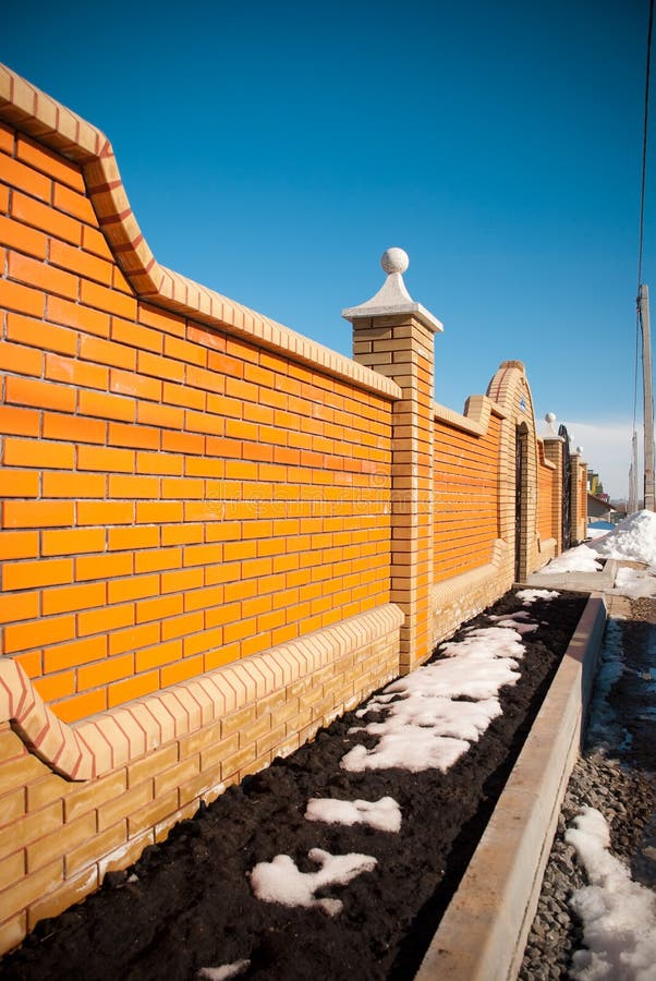 Brick fence royalty free stock photos