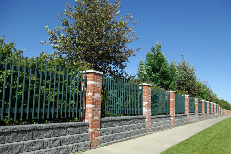 Brick and Iron fence stock image. Image of perspective 22338491