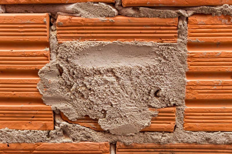 Brick and mortar in an unplastered wall