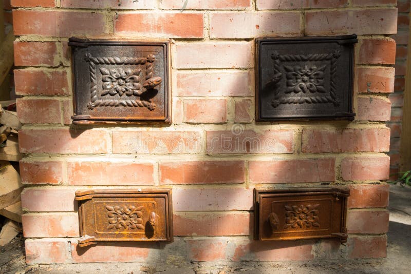 Oven of Red Brick with Cast Iron Doors Close Up Stock Photo Image of brick, furnace 102881632