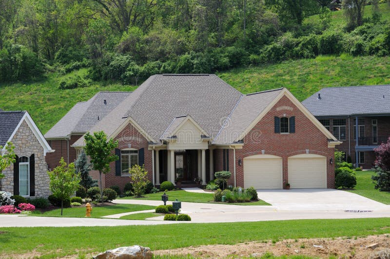 Brick Suburban Homes stock photo. Image of home, building 5585896