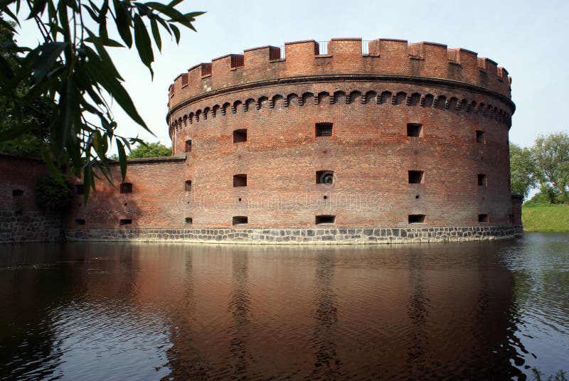 Brick tower and water