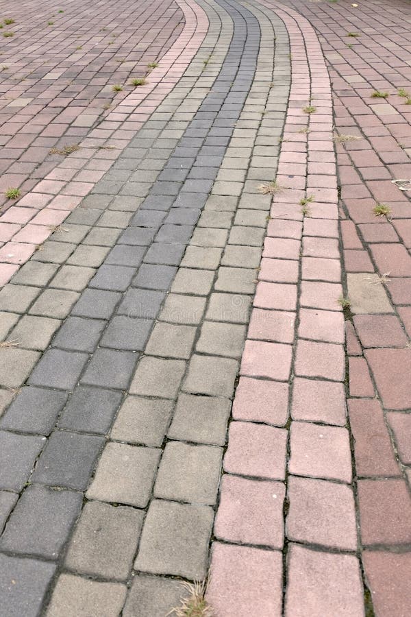 Brick walk path in public park stock photography