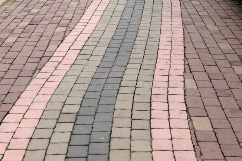 Brick walk path in public park royalty free stock photo