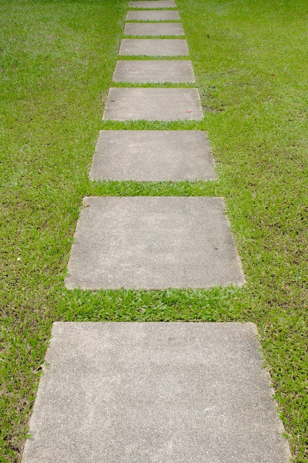 Brick walk path in public park royalty free stock photo