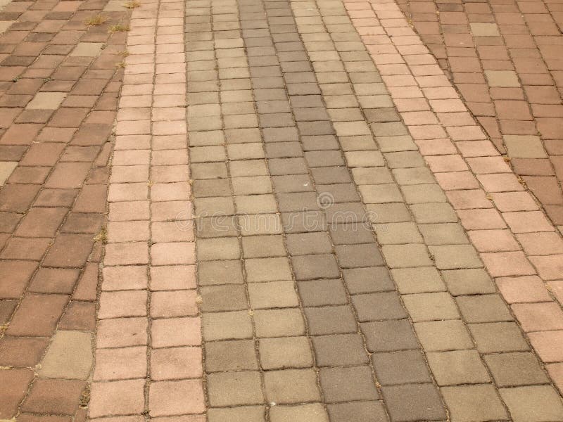 Brick walk path in public park stock images