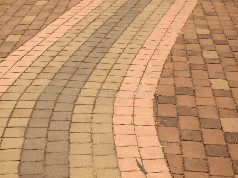 Brick walk path in public park royalty free stock photography