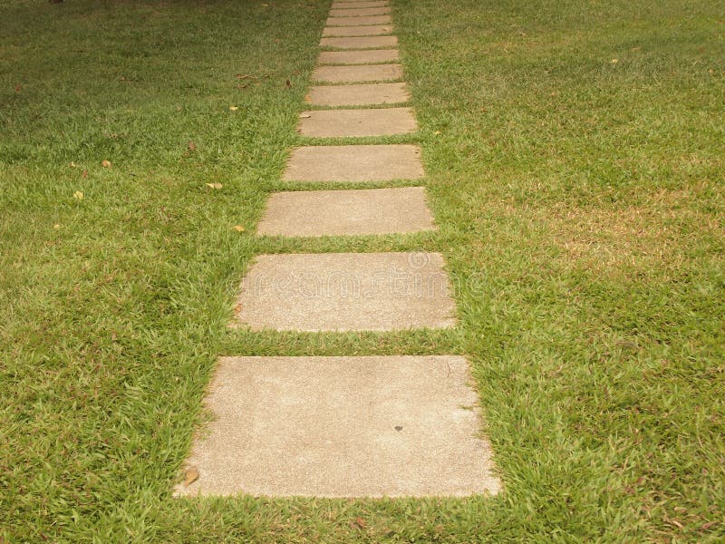Brick walk path in public park royalty free stock photo