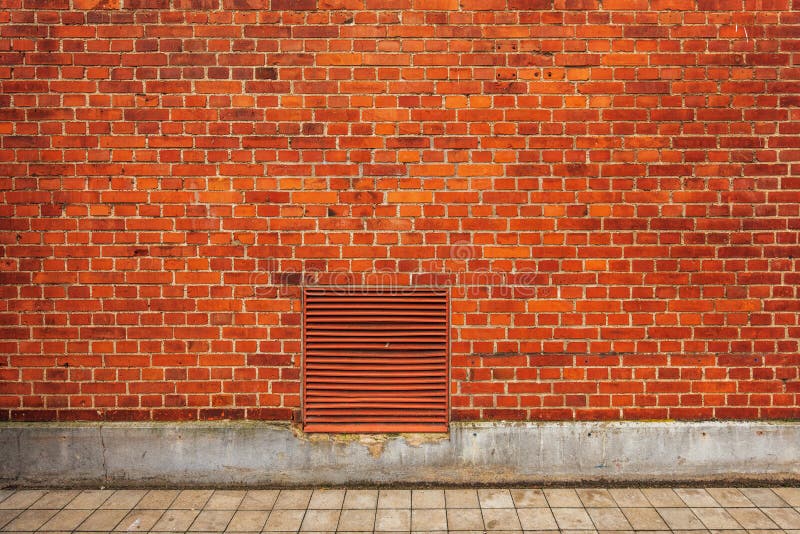 Brick wall building facade, urban street backdrop with no people