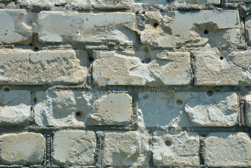 Brick Wall with Bulletholes Stock Photo Image of shothole, closeup