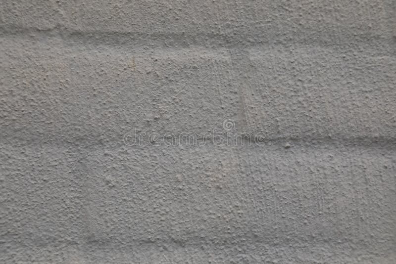 A Brick Wall with a Cement Coating Applied To it Stock Photo Image of