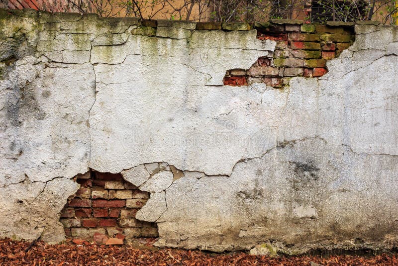 Brick wall cracked plaster