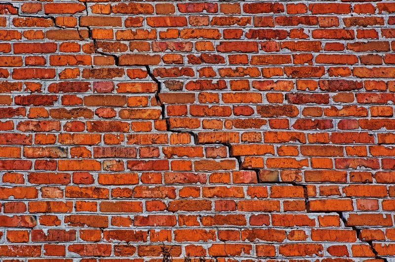 Brick wall with diagonal crack
