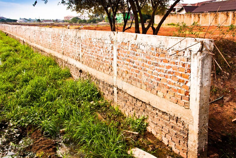 Brick wall fence.